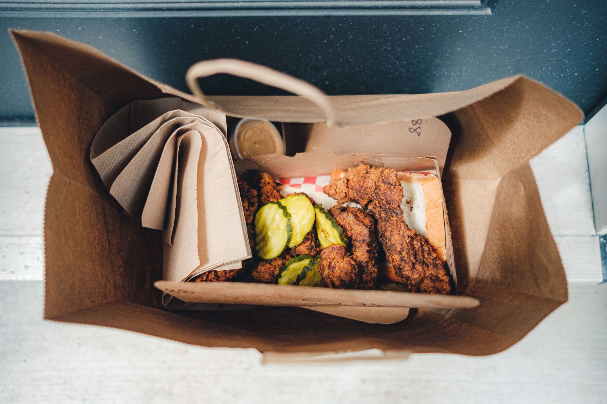 Takeout Bag with Closed Fries on Bottom