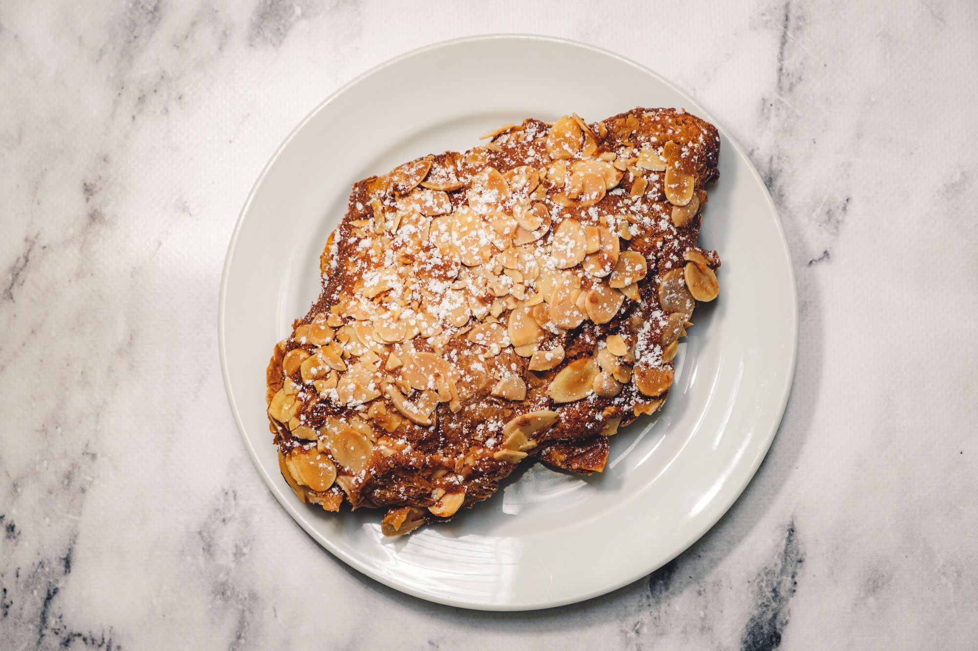 Chez Christophe Double Baked Almond Croissant ($5.75) - Overhead
