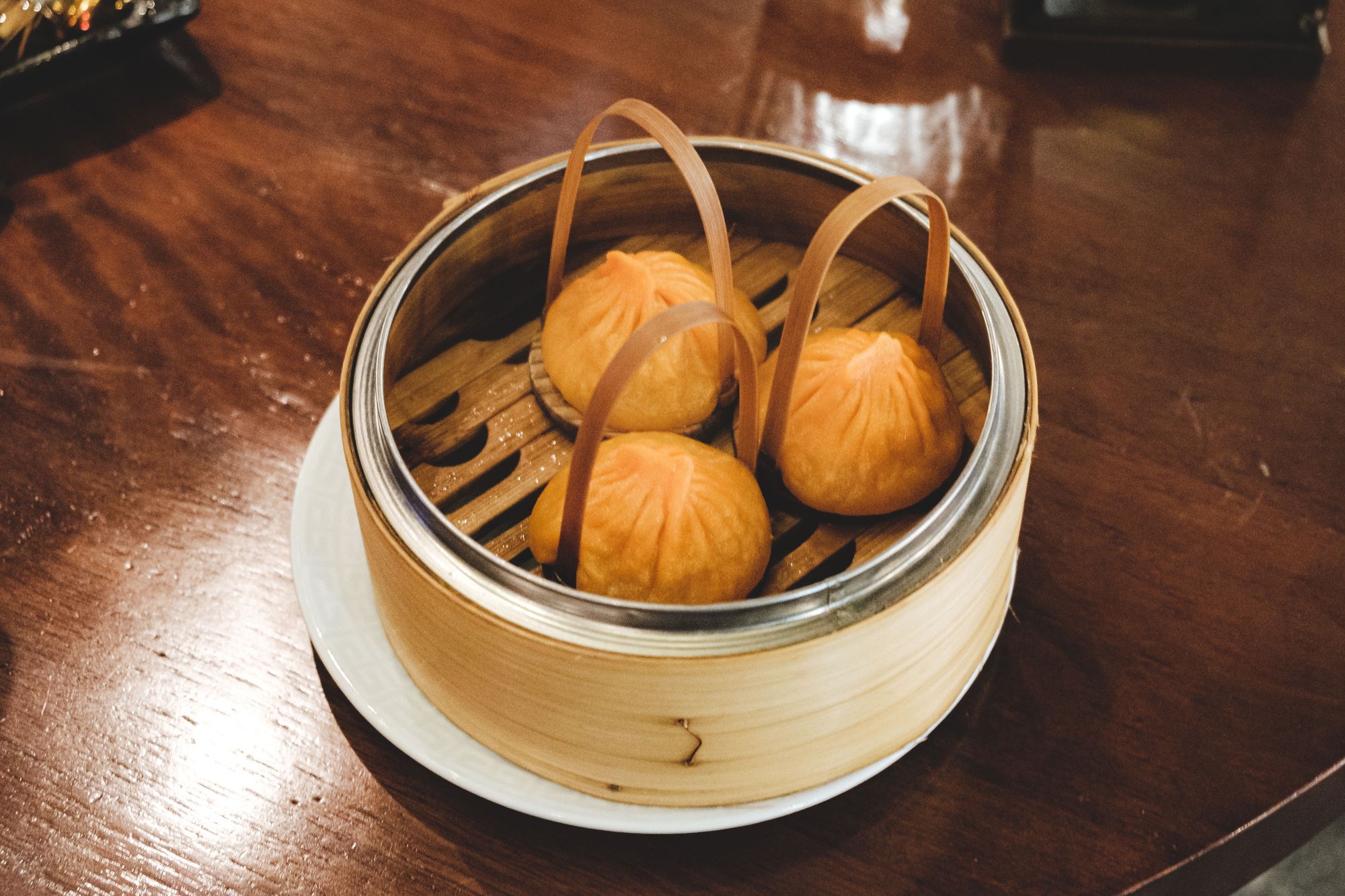 Mott 32 Vancouver – Hot and Sour Iberico Pork Shanghainese Soup Dumplings
